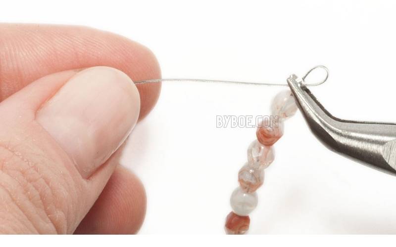 Thread A Needle Onto Your String